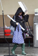 Rachel Bilson shooping in the rain, Los Feliz, Los Angeles, America - 21 Dec 2010