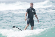 Liev Schreiber taking Surfing Lessons at Bondi Beach