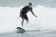 Liev Schreiber taking Surfing Lessons at Bondi Beach