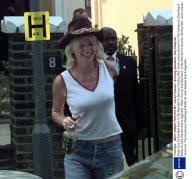 Radio One Dj Zoe Ball Soon To Be Married To Norman 'fat Boy Slim' Cook Leaves Home For The Ceremony Clutching A Bottle Of Jack Daniels And A Cigarette.