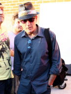 Charlie Sheen leaves a hard days work