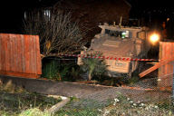 Runaway armoured 'Ranger' vehicle smashes into family home, Portland, Dorset - 11 Jan 2011