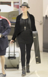 Marion Cotillard pregnant and make up free at LAX