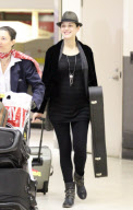 Marion Cotillard pregnant and make up free at LAX