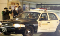 Paris Hilton in a police car