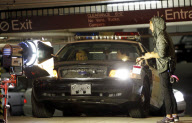 Paris Hilton in a police car