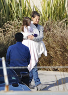 Katie Holmes Touches Down With Suri 