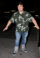 Portly Jack Black flexing his muscles at Matsuhisa
