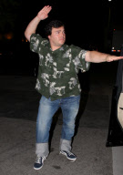 Portly Jack Black flexing his muscles at Matsuhisa