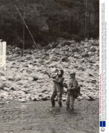 Home Life And Recreation May 29 1952 The Queen Fishes For Salmon Balmoral Scotland: Wearing Waders Tweed Jacket And Headscarf The Queen Elizabeth Ii Fishes For Salmon In The River Dee On The Balmoral Estate. The Duke Of Edinburgh Was Also Fishing - T