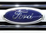 The logo for Ford on display at the Chicago Auto Show