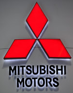 The logo for Mitsubishi on display at the Chicago Auto Show