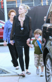 SHARON STONE takes her adopted son QUINN KELLY and her mother DOROTHY STONE shopping