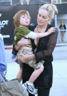 SHARON STONE takes her adopted son QUINN KELLY and her mother DOROTHY STONE shopping