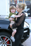 SHARON STONE takes her adopted son QUINN KELLY and her mother DOROTHY STONE shopping
