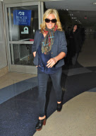 Jane Krakowski Lands At LAX With A Baby Bump