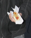 MICHAEL DOUGLAS RUNS OUT OF HIS CAR TO GET "HEALTHY" HOT DOG ONLY TO REALIZE HE DOESN'T HAVE ANY MONEY AND HAS TO BORROW SOME FROM HIS DRIVER. 