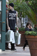 *EXCLUSIVE* Travis Barker buys books for the kids at Barnes and Noble