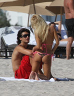 Shauna Sand spent the afternoon frolicking with her young new HUSBAND ! in Miami Beach.
