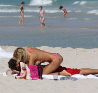 Shauna Sand spent the afternoon frolicking with her young new HUSBAND ! in Miami Beach.