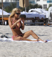Shauna Sand spent the afternoon frolicking with her young new HUSBAND ! in Miami Beach.