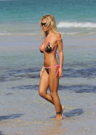 Shauna Sand spent the afternoon frolicking with her young new HUSBAND ! in Miami Beach.