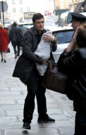 Orlando Bloom, Miranda Kerr and their baby boy Flynn arrive in Paris.