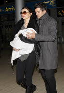 Orlando Bloom, Miranda Kerr and their baby boy Flynn arrive in Paris.