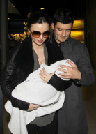 Orlando Bloom, Miranda Kerr and their baby boy Flynn arrive in Paris.