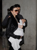 Orlando Bloom, Miranda Kerr and their baby boy Flynn arrive in Paris.