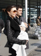 Orlando Bloom, Miranda Kerr and their baby boy Flynn arrive in Paris.