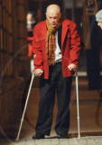 John Malkovich on crutches after breaking his leg