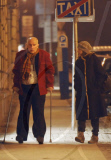 John Malkovich on crutches after breaking his leg