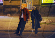 John Malkovich on crutches after breaking his leg