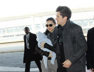 Orlando Bloom Miranda Kerr and son Flyn at Paris airport