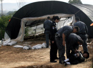 Israeli police arresting ultra Orthodox Jews during a protest against digging up tombs, Haifa, Israel - 06 Mar 2011