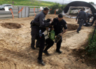 Israeli police arresting ultra Orthodox Jews during a protest against digging up tombs, Haifa, Israel - 06 Mar 2011