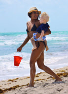 Lilly Becker and Son Play at the Beach