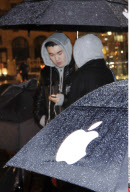 NY: APPLE FANS WAIT IN THE RAIN FOR IPAD 2 RELEASE