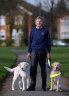 Graham Waspe with his guide dogs Edward and Opal, Stowmarket, Suffolk, Britain - 10 Mar 2011