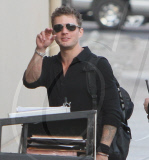Hollywood stud Ryan Phillippe waves hello