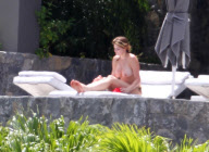 ADDITIONAL WEB FEES...   Topless Stephanie Seymour Soaks Up Sun On Sun Deck