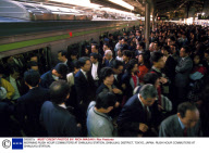 MORNING RUSH HOUR COMMUTERS AT SHINJUKU STATION, SHINJUKU DISTRICT, TOKYO, JAPAN.