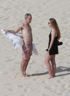 EXCLUSIVE... Exclusive... John McEnroe Gets Sun Block Help From Ava