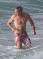 EXCLUSIVE... Exclusive... John McEnroe Gets Sun Block Help From Ava