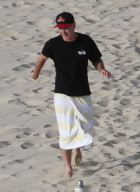 EXCLUSIVE... Exclusive... John McEnroe Gets Sun Block Help From Ava
