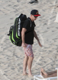 EXCLUSIVE... Exclusive... John McEnroe Gets Sun Block Help From Ava
