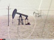 CHINA: FLOODS: DAQUIN (XINHUA): OIL WELLS TOWERS STAND ALONE IN FLOOD WATER; 226 OIL