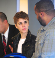 Justin Bieber Shows Off His Galaxy Tab at LAX