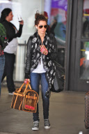 Ashley Tisdale Lands At LAX